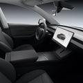 ACP10031 - Model Y (2026) Wireless Charging Pad Cover | TO261JH in Black showing the front and the driver's seat