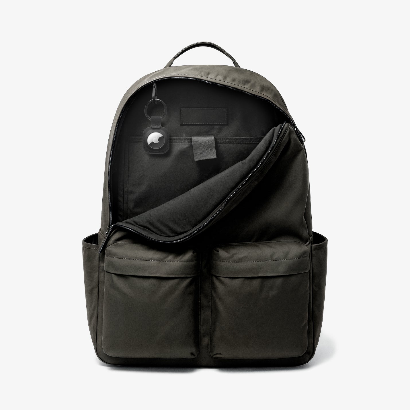ACS09750 - AirTag Holder Keychain | AT200 in Black showing the airtag with holder attached inside the bag