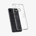 ACS08567 - Nothing Phone (3) Case Ultra Hybrid in Crystal Clear showing the back and partial side, hovering in front of the device