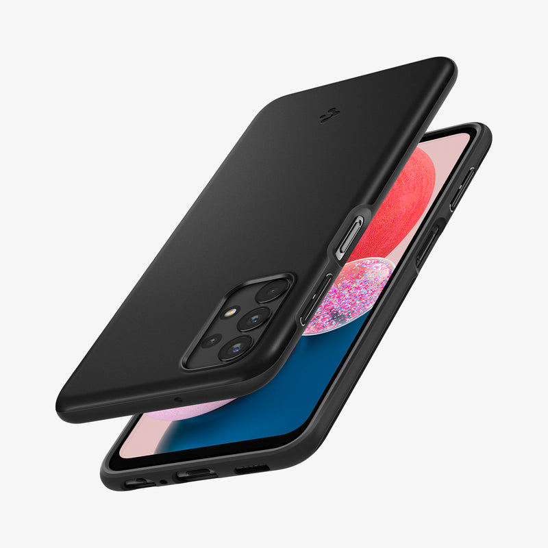 ACS04314 - Galaxy A13 Case Thin Fit in Black showing the back, partial side and top hovering in front of a device showing partial front, side and bottom