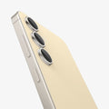 AGL07444 - Galaxy S24 Optik Pro EZ Fit Lens Protector in Yellow showing the partial side of the camera lens protector, partial side and partial back of the device, half bodied, zoomed in