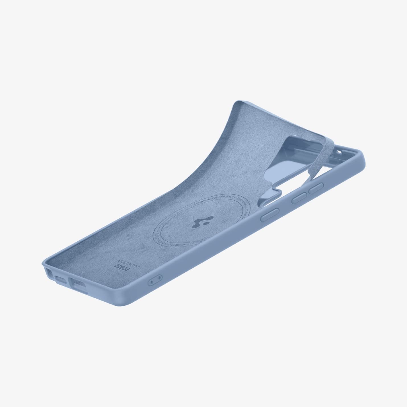 ACS09018 - Galaxy S25 Ultra Case Silicone Fit (MagFit + Qi2 Ready) in Sapphire Blue showing the partial side, bottom and inner layer fabric partially peeled off from the back cover of the case