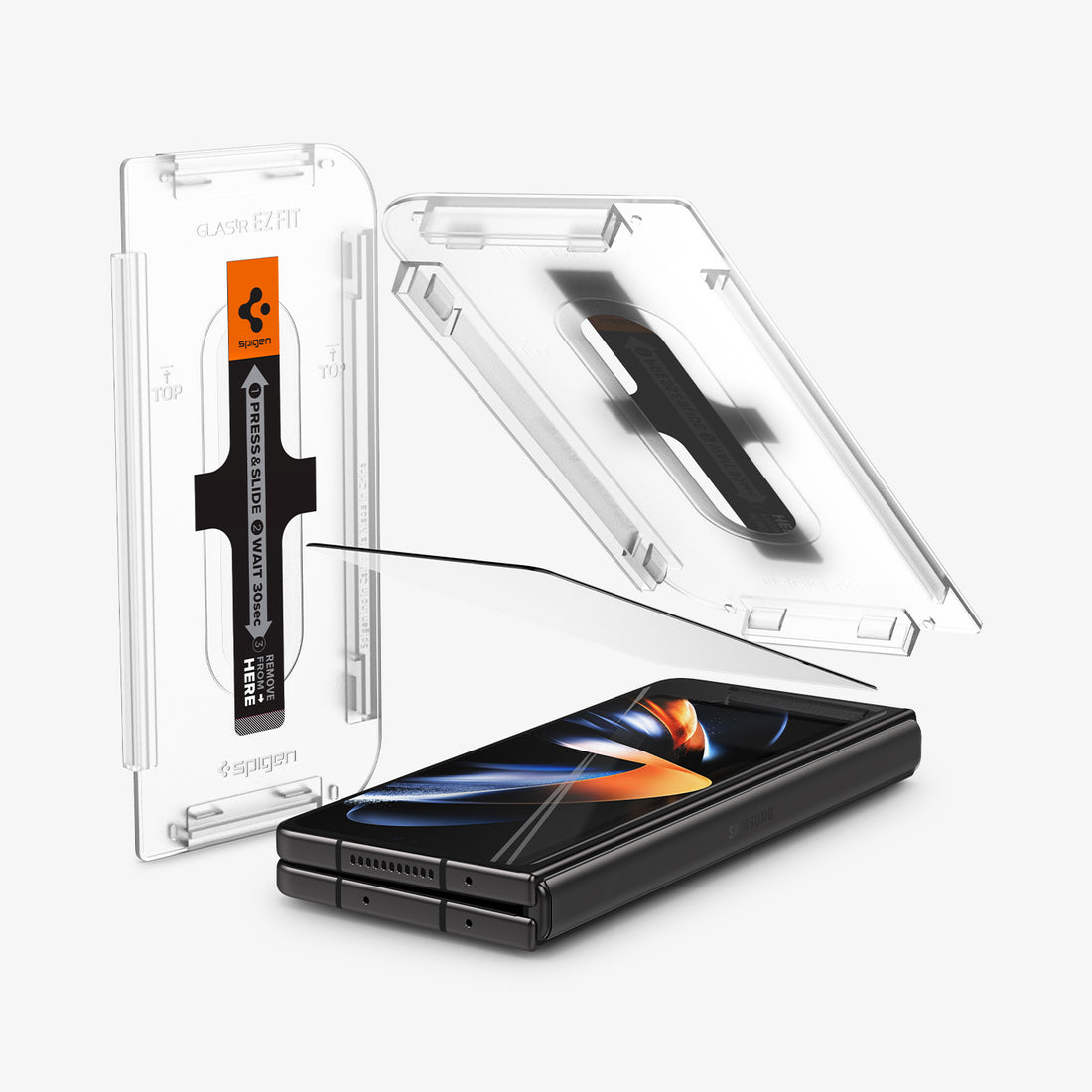 AGL05543 - Galaxy Z Fold 4 Series GLAS.tR EZ Fit showing the installation tray hovering above the glass protector and device beside the packaging