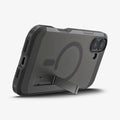 ACS08515 - iPhone 16 Case Tough Armor AI (MagFit) in Frost Black showing the back, partial side and bottom with built-in kickstand propped up