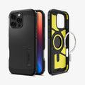 ACS08146 - iPhone 16 Pro Case Tough Armor AI (MagFit) in Black showing the back, partial sides and front, metal ring plate detached from the inner case