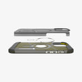 ACS08509 - iPhone 16 Pro Case Tough Armor AI (MagFit) in Frost Black showing the partial back layer detached hovering above the metal ring plate and back of the case