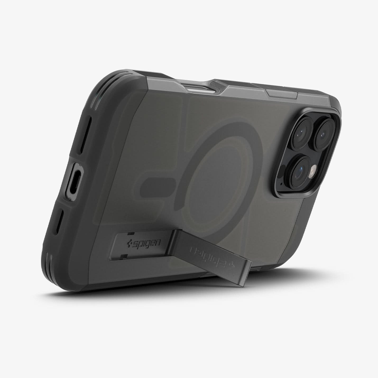 ACS08509 - iPhone 16 Pro Case Tough Armor AI (MagFit) in Frost Black showing the back, partial side and bottom with built-in kickstand propped up