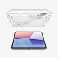 AGL07788 - iPad Pro 11-inch GLAS.tR EZ FIT in Clear showing the alignment tray with screen protector hovering above the device in portrait position