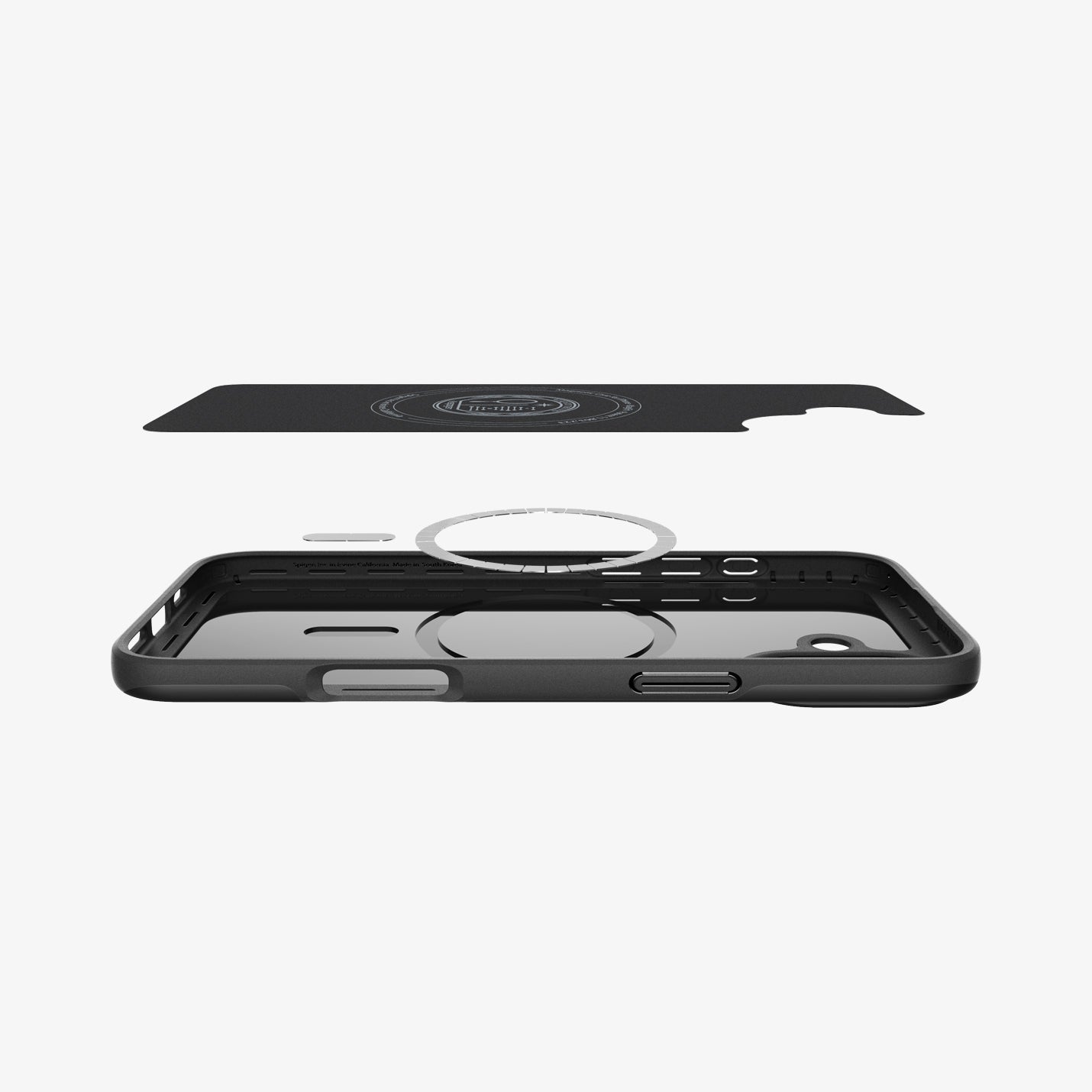 ACS08060 - iPhone 16 Plus Case Thin Fit (MagFit) in Black showing the inner layer hovering above the detached magnet ring plate and the case
