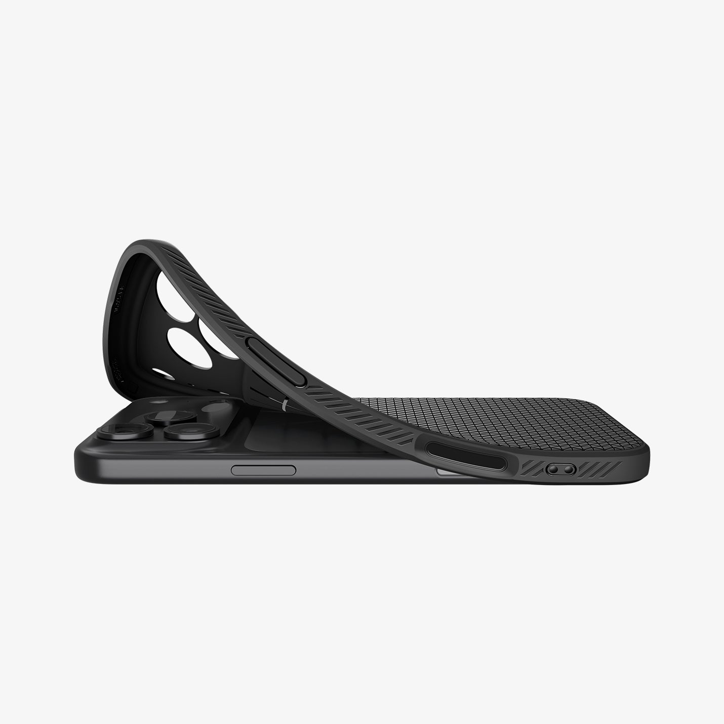 ACS09942 - iPhone 17 Pro Liquid Air in Matte Black showing the back, partially peeled off from the device on a flat surface