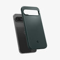 ACS07699 - Pixel 9 Pro Case Thin Fit in Abyss Green showing the back, partially hovering in front of the device