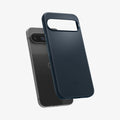 ACS07698 - Pixel 9 Pro Case Thin Fit in Metal Slate showing the back, partially hovering in front of the device