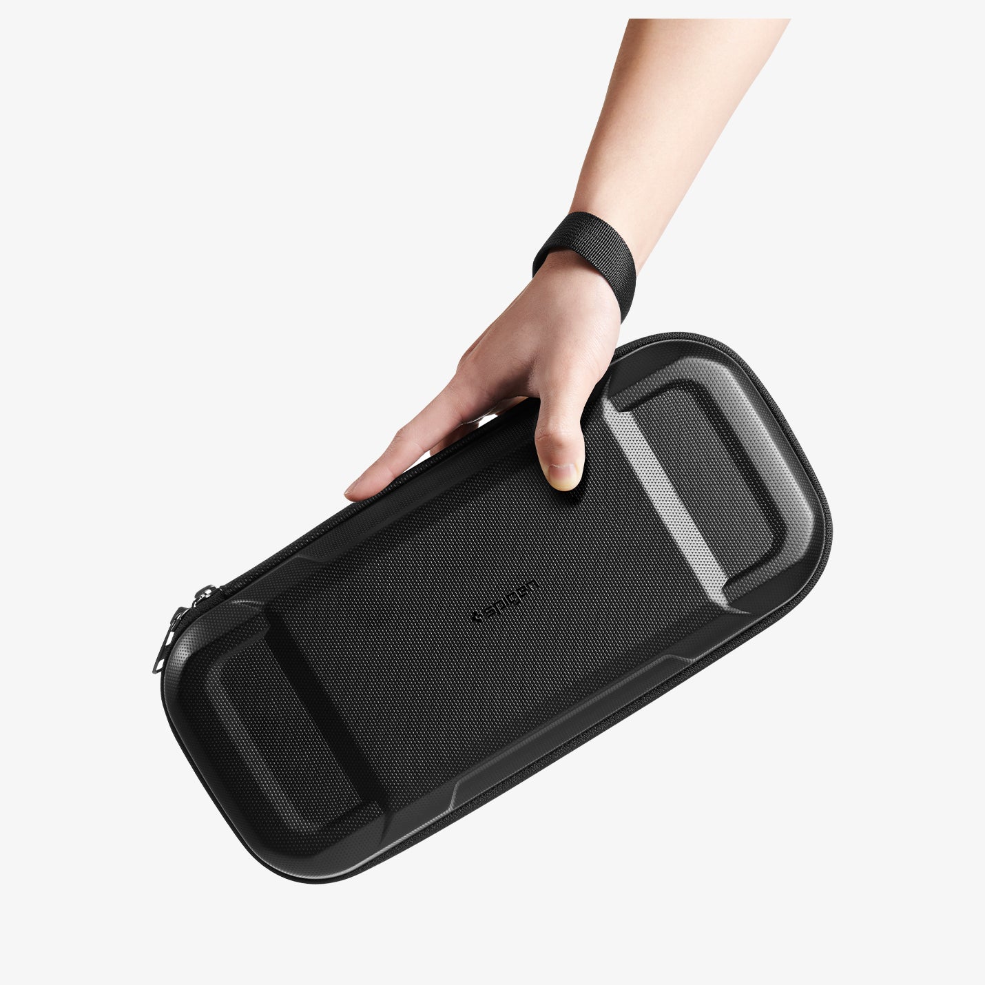 AGP09475 - Nintendo Switch 2 Rugged Armor Pro Pouch in Black showing a person holding the case while strapped on his wrist