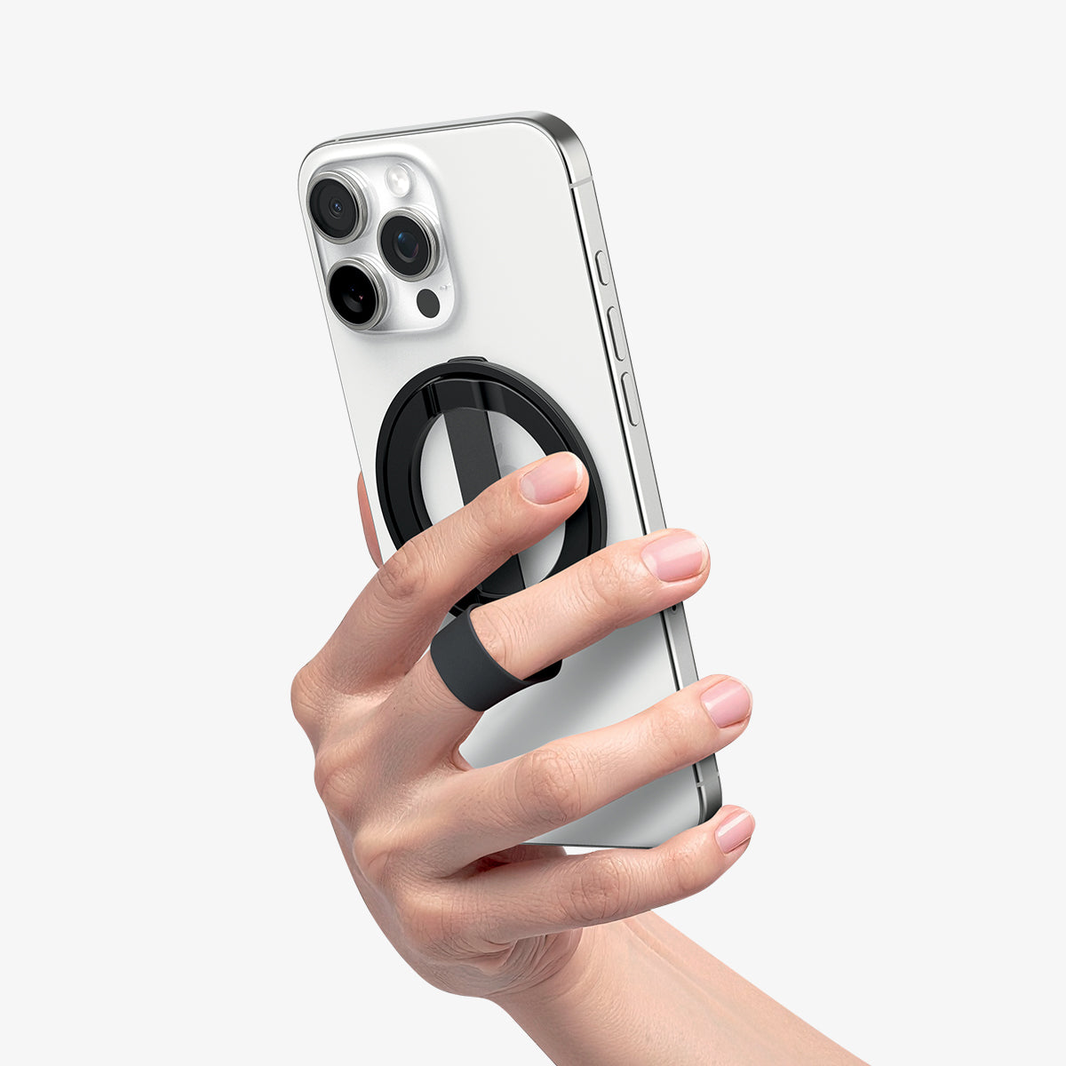 AMP08551 - O-Mag Magnetic Phone Holder (MagFit) | OM103 in Black showing a person holding the ring holder attached to the device