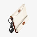AFA08348 - Passport Holder in dune beige showing the back, side and airtag on attached keychain