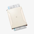 AFA08348 - Passport Holder in dune beige showing the front with ticket inserted