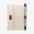 AFA08348 - Passport Holder in dune beige showing the back with pen in slot