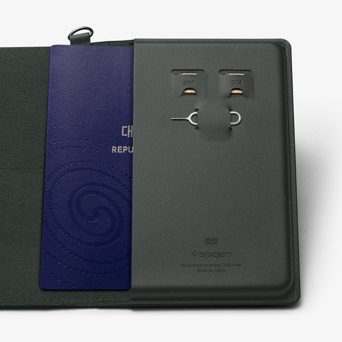 AFA08347 - Passport Holder in military green showing the inner slot of passport, sim slots for sim cards and a pin ejector