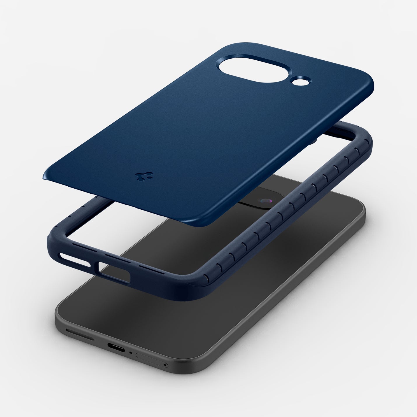 ACS09038 - Pixel 9a Case Thin Fit (MagFit) in Navy Blue showing the back layer hovering above the detached tpu frame and the device
