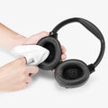 ASD09691 - Spigen Active Noise Cancelling SA2403 in Black showing a person cleaning the inner of the ear cup