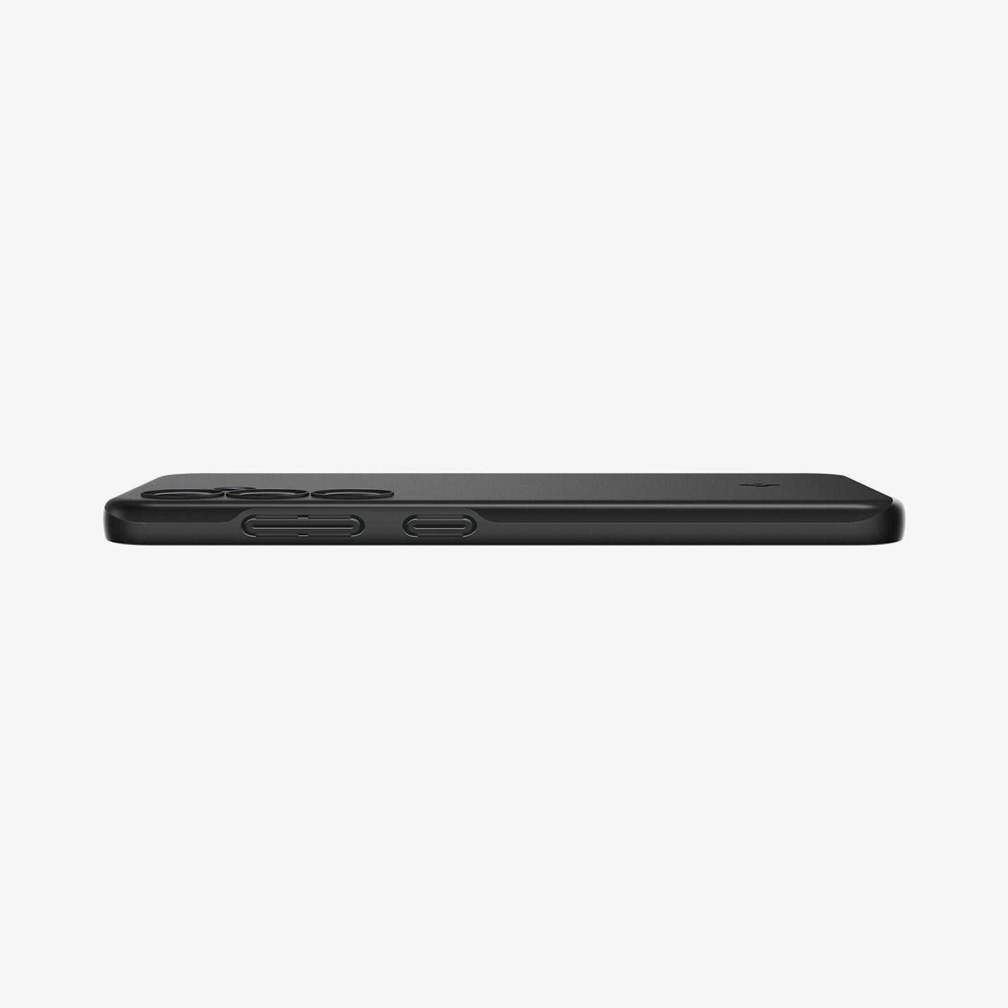 ACS07341 - Galaxy S24 Case Thin Fit in Black showing the side with side buttons, partial back on a flat surface