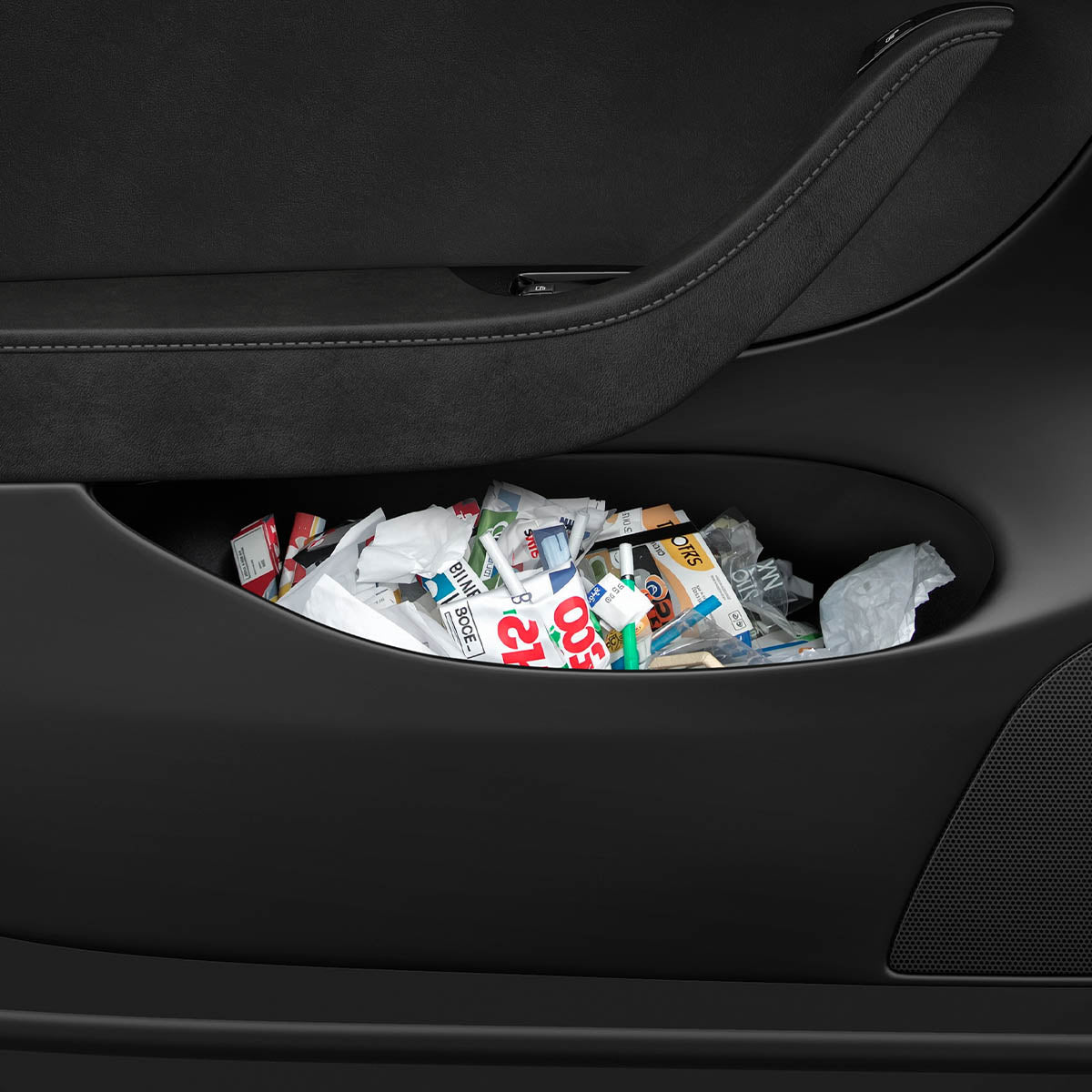 ACP09183 – Tesla Model Y Car Trash Bin in black showing trashes inside of car