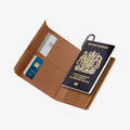 AFA08348 - Passport Holder in dune beige showing the inner with cards inserted on the side pockets and a passport attached