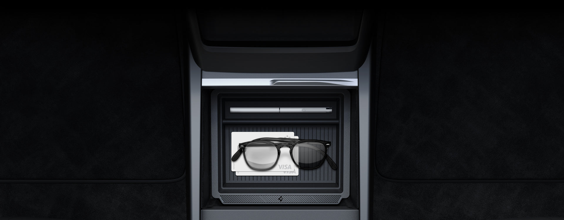 Showing the Spigen Organization Compartment with two visa cards, pen, and glasses in Tesla