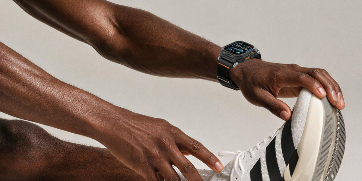 man stretching while wearing Apple Watch