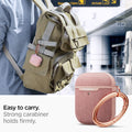 074CS27598 - Apple AirPods 1 / 2 Case Urban Fit in rose gold showing how it is easy to carry. Strong carabiner holds firmly