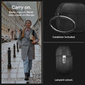 ACS05483 - Apple AirPods Pro 2 Case Urban Fit in black showing how it can easily clips on. You will never miss a beat on-the-go with carabiner and lanyard cutout