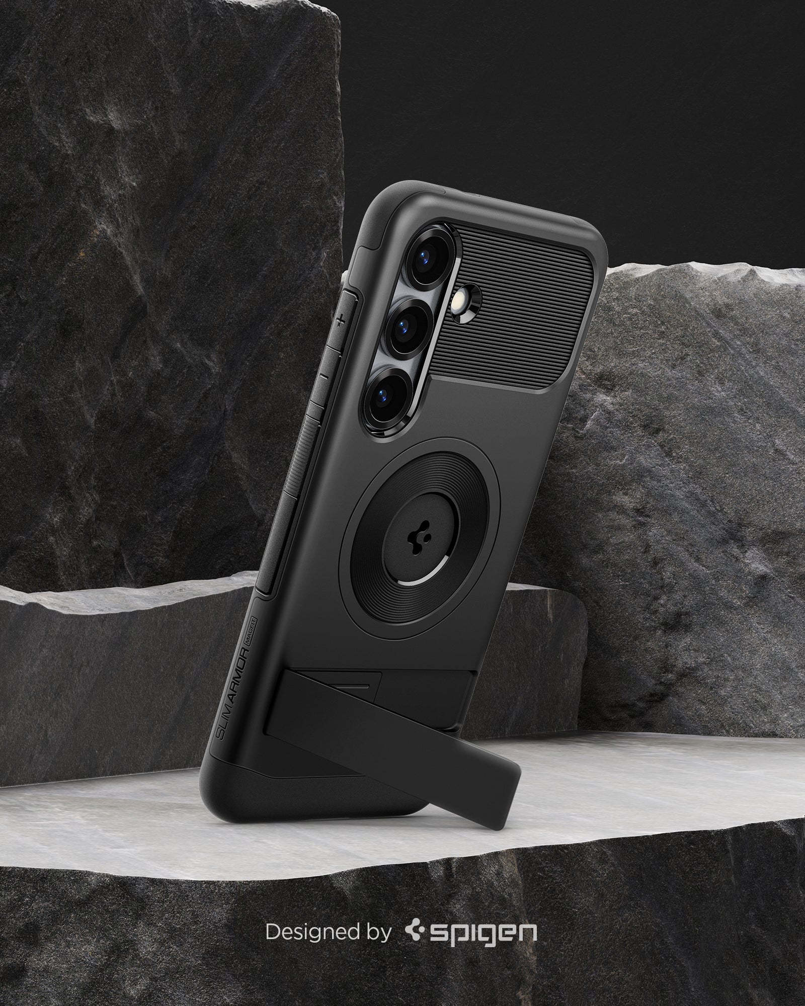 ACS08915 - Galaxy S25 Plus Case Slim Armor (MagFit) in Black designed by spigen. Showing the phone on the rock.