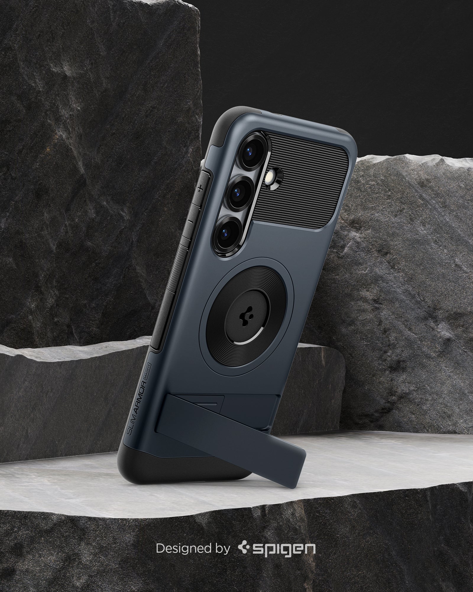ACS08914 - Galaxy S25 Plus Case Slim Armor (MagFit) in Metal Slate designed by spigen. Showing the phone on the rock.