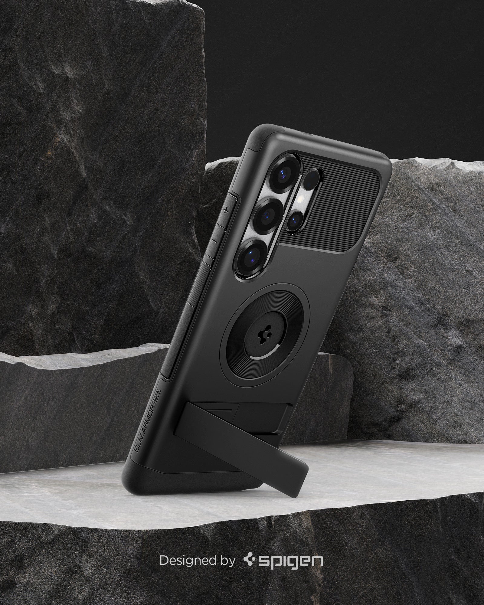 ACS08909 - Galaxy S25 Ultra Case Slim Armor (MagFit) in Black designed by spigen. Showing the phone on the rock.