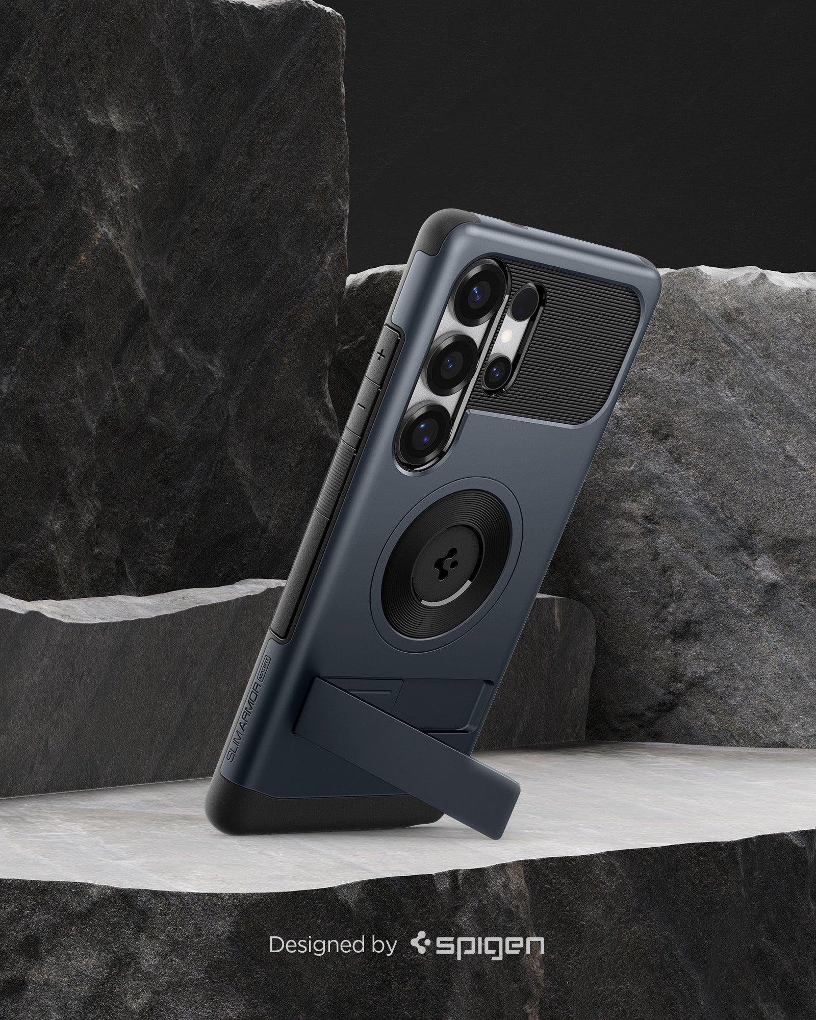 ACS08908 - Galaxy S25 Ultra Case Slim Armor (MagFit) in Metal Slate designed by spigen. Showing the phone on the rock.