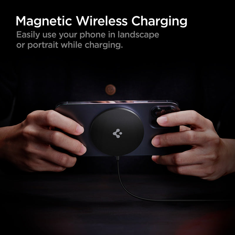 ACH02190 - ArcField™ Magnetic 7.5W Wireless Charger PF2009 (MagFit) in Black showing the Magnetic Wireless Charging. Easily use your phone in landscape or portrait while charging. A man holding a device while attached to a wireless charger