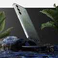 ACS05662 - Galaxy S23 Plus Case Liquid Crystal in crystal clear showing back over the water.