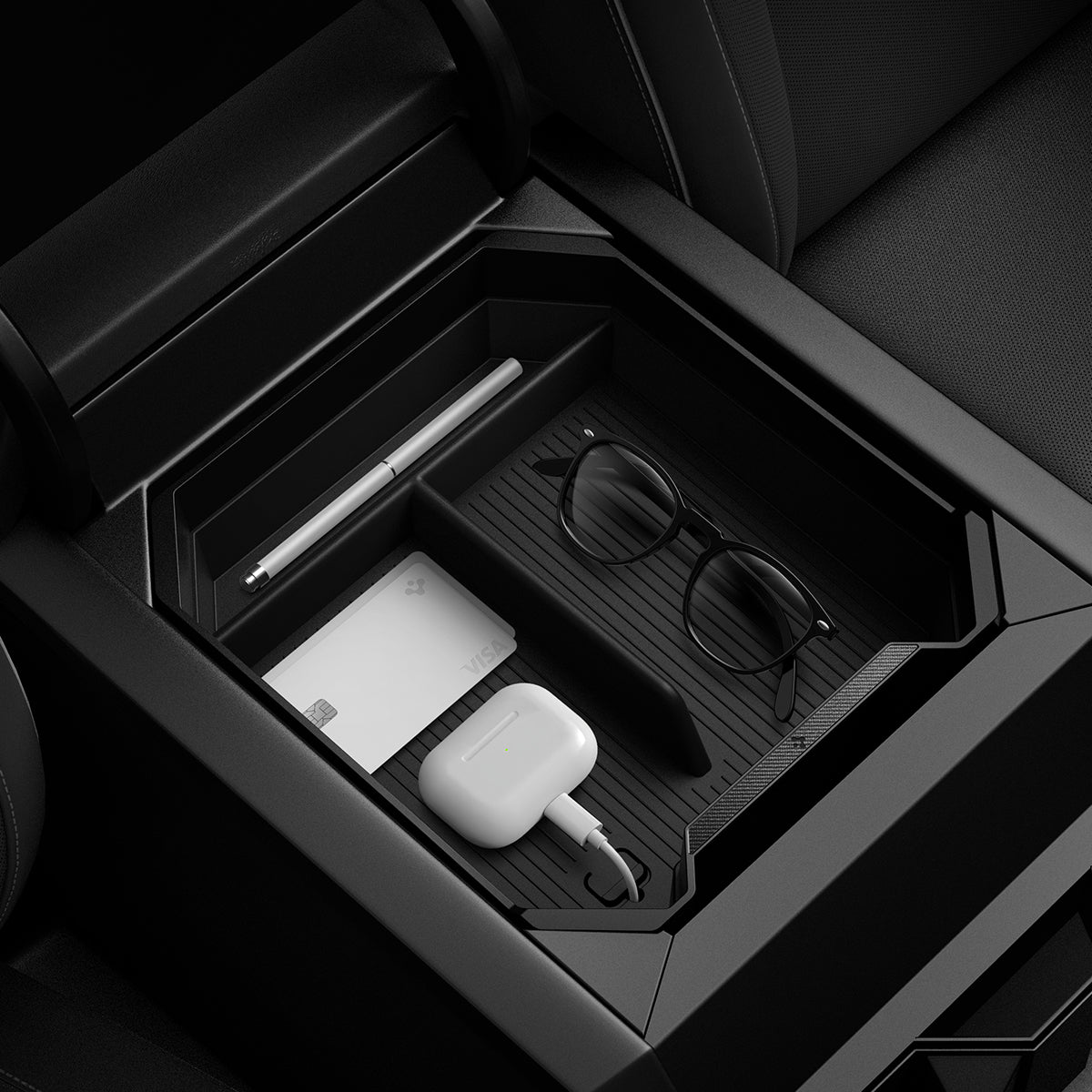 ACP07809 - Tesla Cybertruck Center Console Organizer Tray CO220T in Black showing the top, exposing the inner with multiple stuffs stored inside installed to a center console