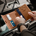 AFA08348 - Passport Holder in dune beige showing the whole inner with slots for cards, passport, sim cards and pin ejector