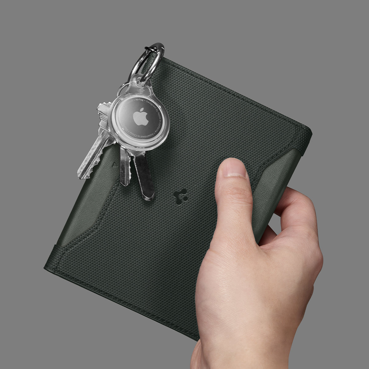 AFA08347 - Passport Holder in military green showing the front with carabiner attached for airtag and keys