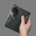 AFA08347 - Passport Holder in military green showing the front with carabiner attached for keys