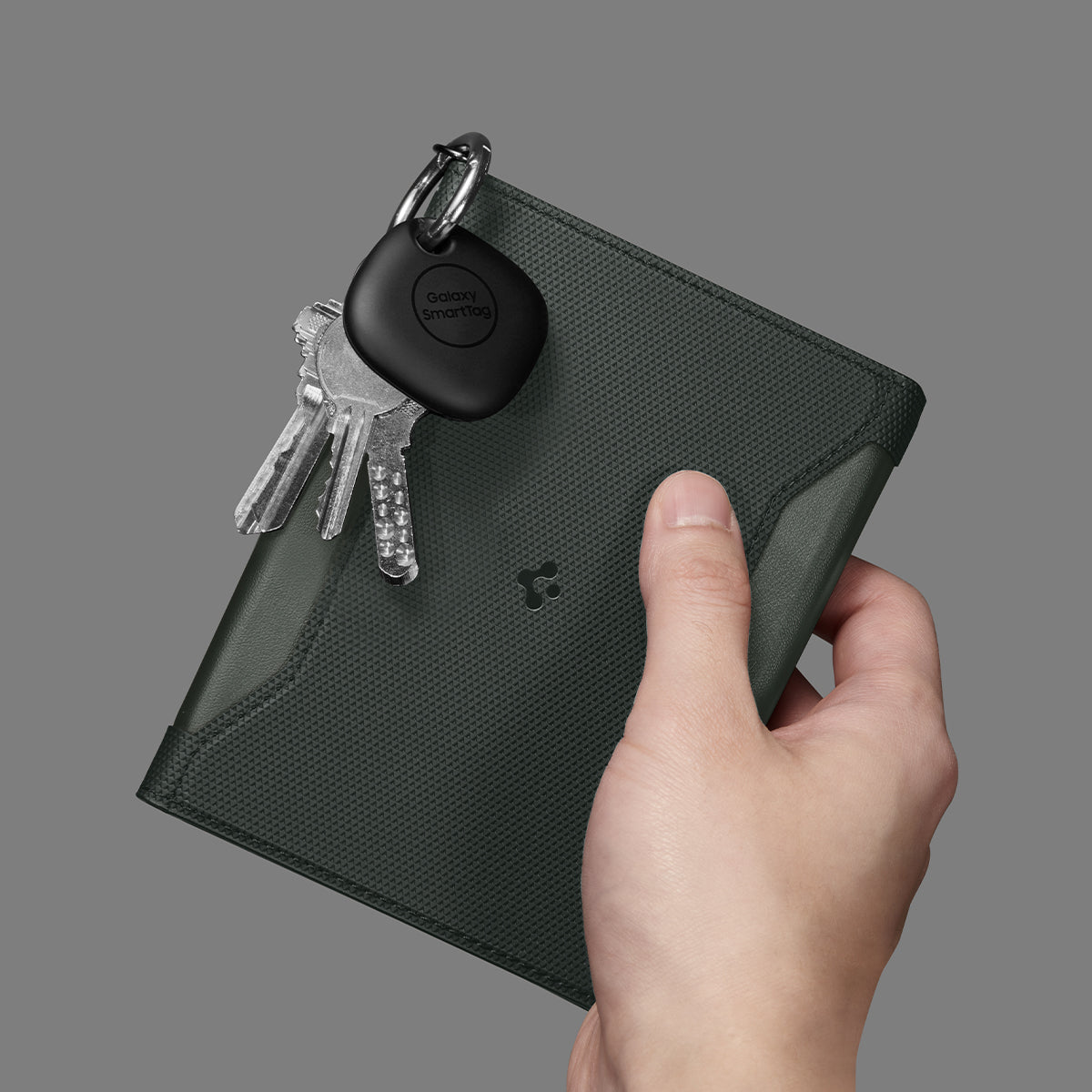 AFA08347 - Passport Holder in military green showing the front with carabiner attached for keys