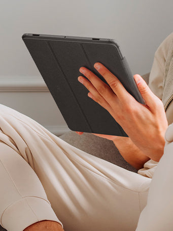 Person holding Galaxy Tab Liquid Air Folio in Black