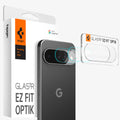 AGL09663 - Pixel 10 Pro XL Optik EZ Fit Lens Protector showing the installation tray hovering in front of the lens protector and the device, behind it, is the packaging