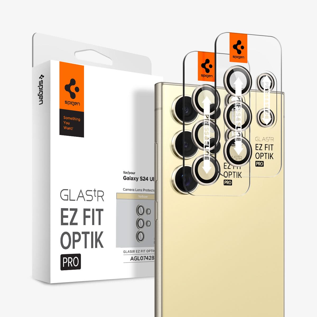 AGL07428 - Galaxy S24 Ultra Optik Pro EZ Fit Lens Protector in Yellow showing the front of camera lens tray hovering in front of another camera lens tray and the device with the packaging