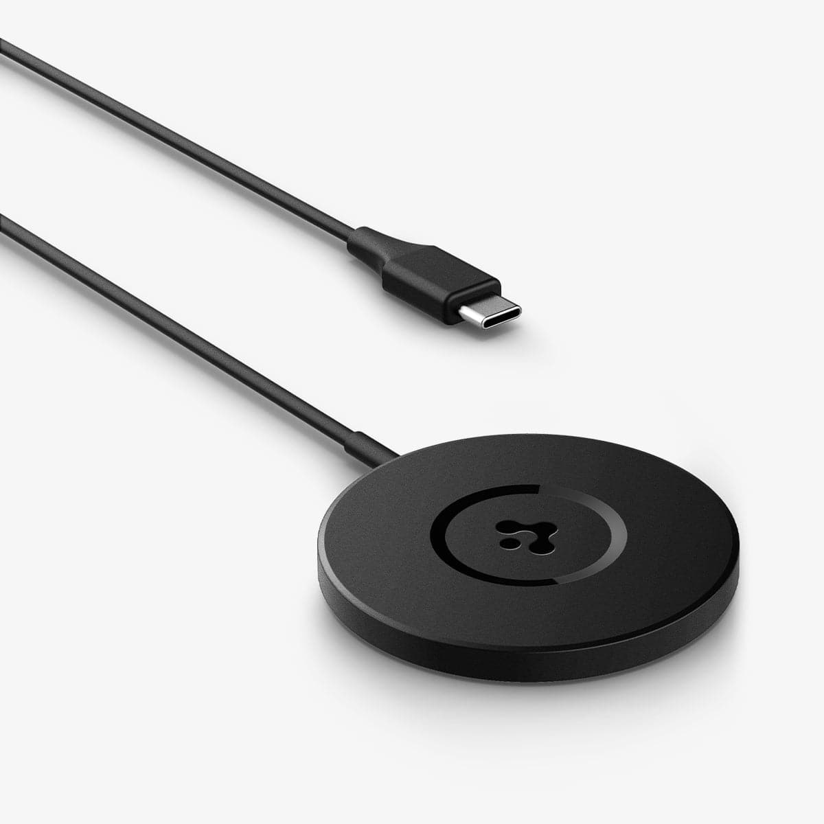 ACH04238 - ArcField™ Magnetic Wireless Charger PF2101 (MagFit) in black showing the front with end of charging plug next to it