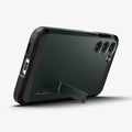 ACS05720 - Galaxy S23 Case Tough Armor in abyss green showing the back and bottom with device propped up by built in kickstand