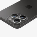AGL05599 - iPhone 15 Pro / 15 Pro Max Optik Pro Lens Protector in silver showing the back, top and side zoomed in on camera lens