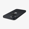 AGL05274 - iPhone 14 / 14 Plus Optik Lens Protector in black showing the optik lens protector being installed onto camera lens