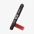 ACS06814 - iPhone 15 Case Tough Armor (MagFit) in red showing the bottom with device propped up by built in kickstand